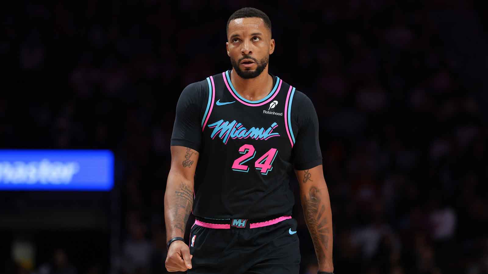 Heat guard Norman Powell (24) looks on against the Cleveland Cavaliers during the third quarter at Kaseya Center with ESPN's Kendrick Perkins and the Clippers logo in the background