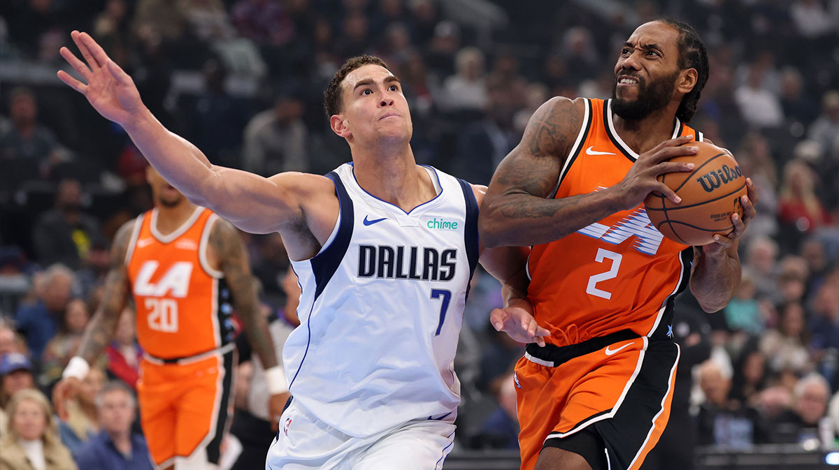 Los Angeles Clippers forward Kawhi Leonard (2) drives to the basket against Dallas Mavericks forward/center Dwight Powell (7) during the first quarter at Intuit Dome.