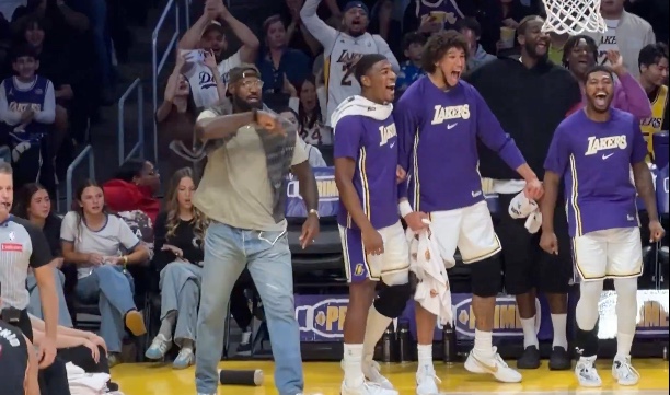 LeBron James celebrates Bronny James basket against the Miami Heat