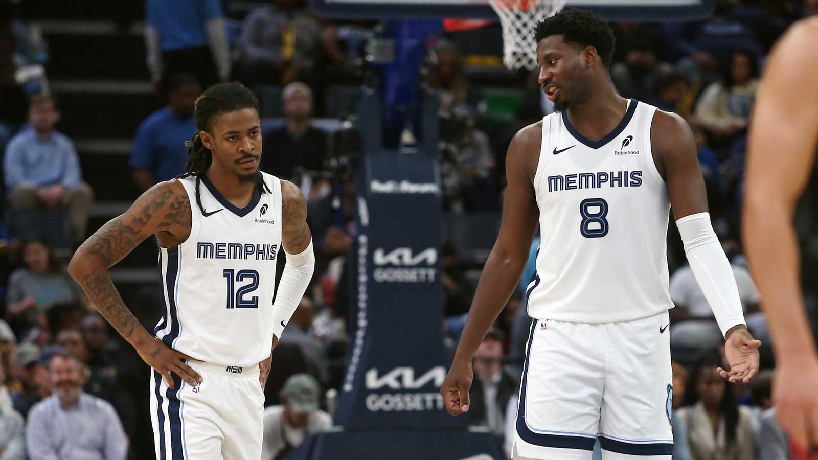 Memphis Grizzlies forward/center Jaren Jackson Jr. (8) talks with guard Ja Morant (12) during the second quarter against the Houston Rockets at FedExForum. 