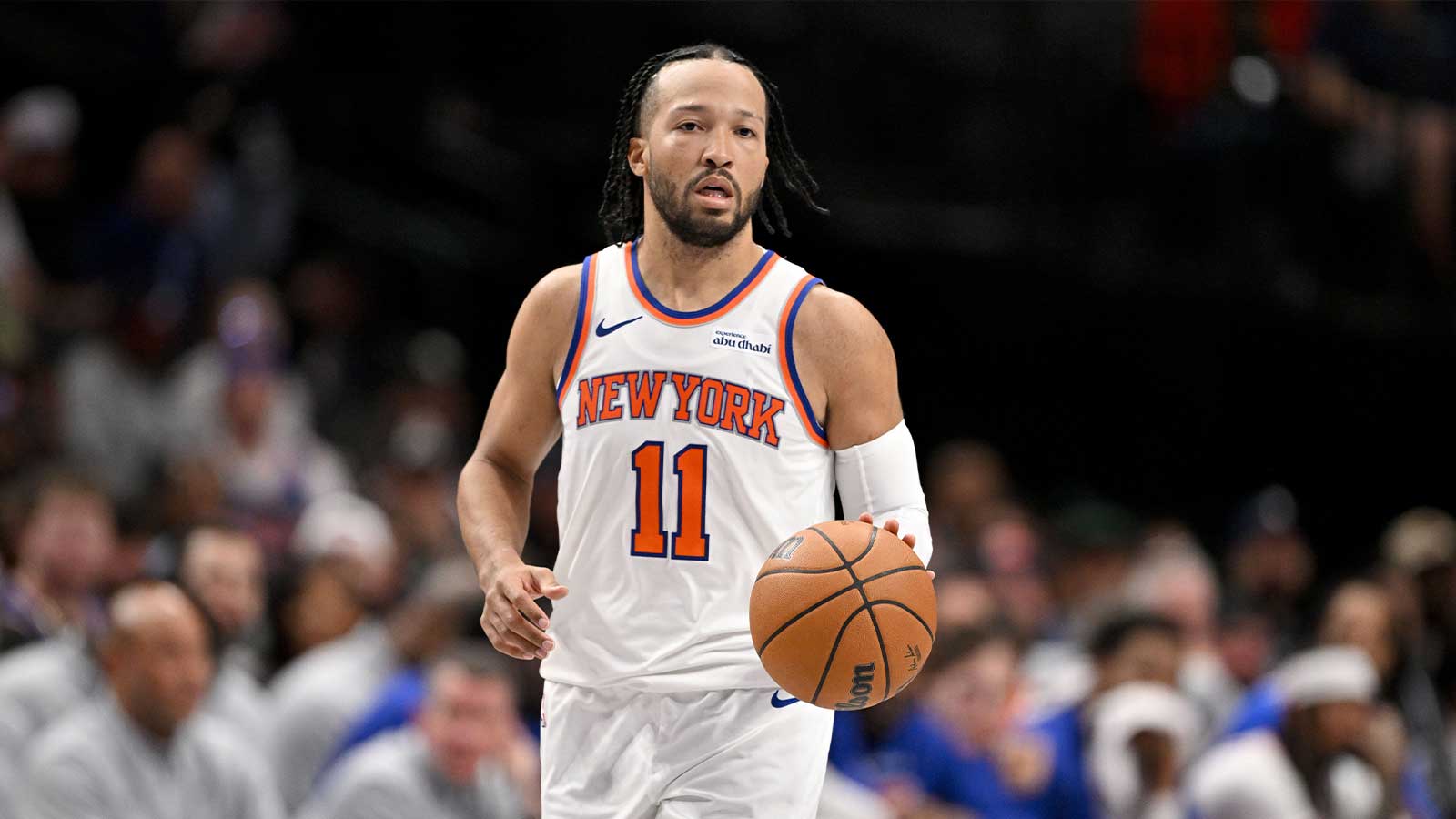 New York Knicks guard Jalen Brunson (11) brings the ball up court against the Dallas Mavericks during the second half at the American Airlines Center.