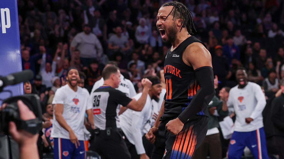 New York Knicks guard Jalen Brunson (11) reacts after making a basket during the second half against the Milwaukee Bucks at Madison Square Garden.