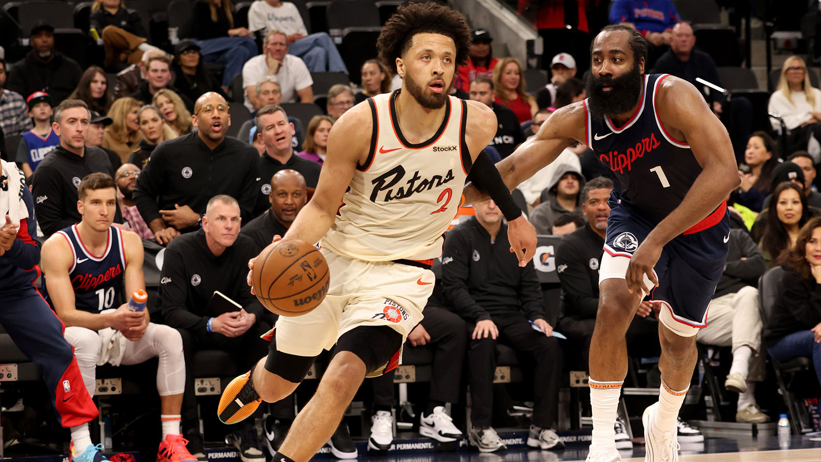 Detroit Pistons guard Cade Cunningham (2) drives against LA Clippers guard James Harden (1) during the third quarter at Intuit Dome. 