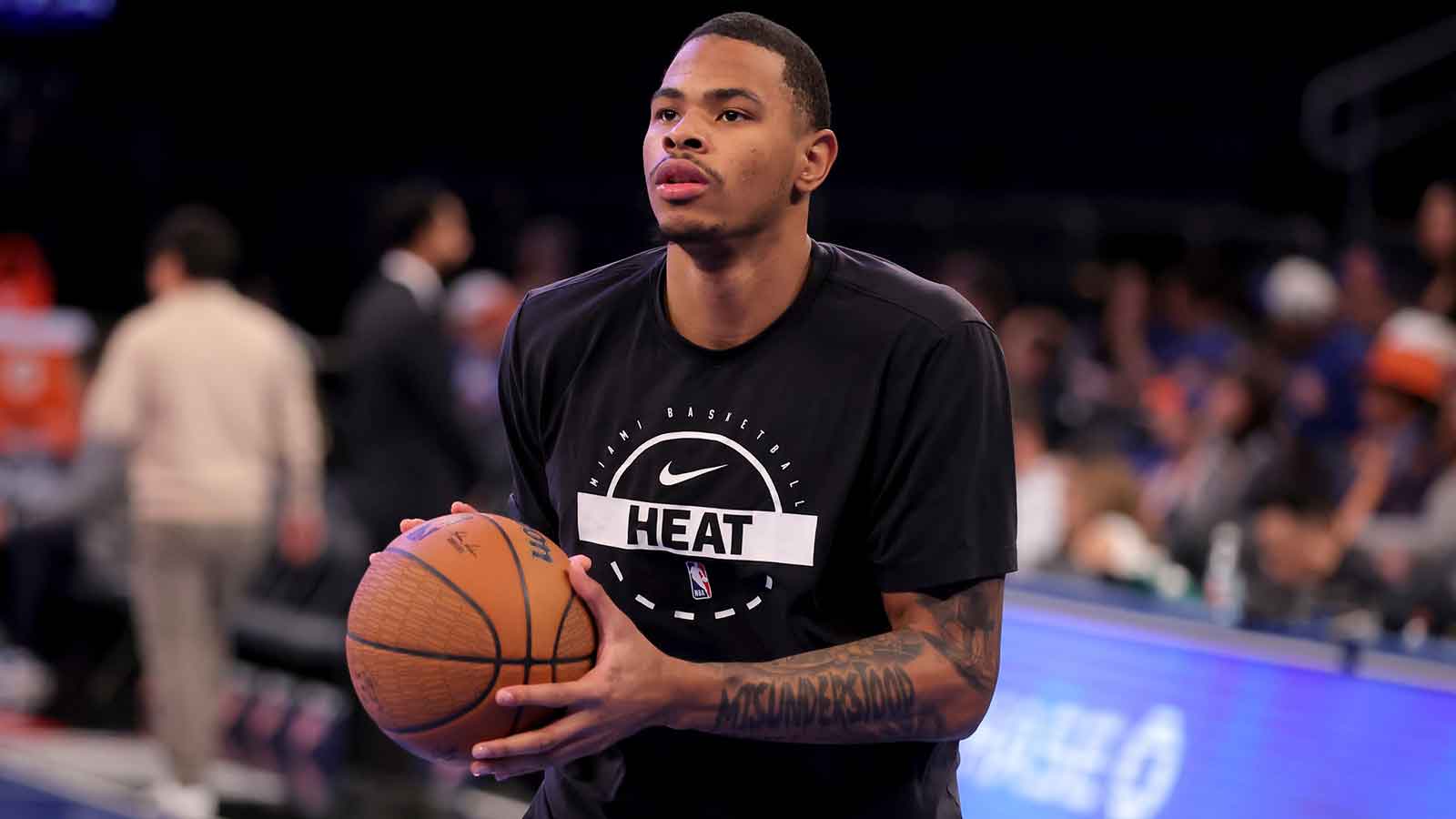 Miami Heat forward Keshad Johnson (16) warms up before a game against the New York Knicks at Madison Square Garden.