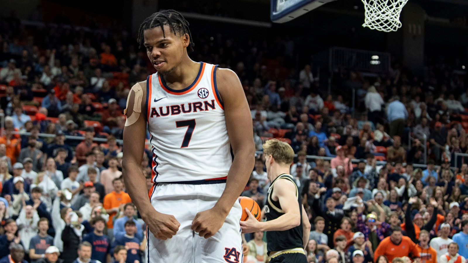 Arizona Wildcats guard Anthony Dell'Orso (3) celebrates with guard Jaden Bradley (0) during the second half of the Hall of Fame Series game against the UCLA Bruins at Intuit Dome.