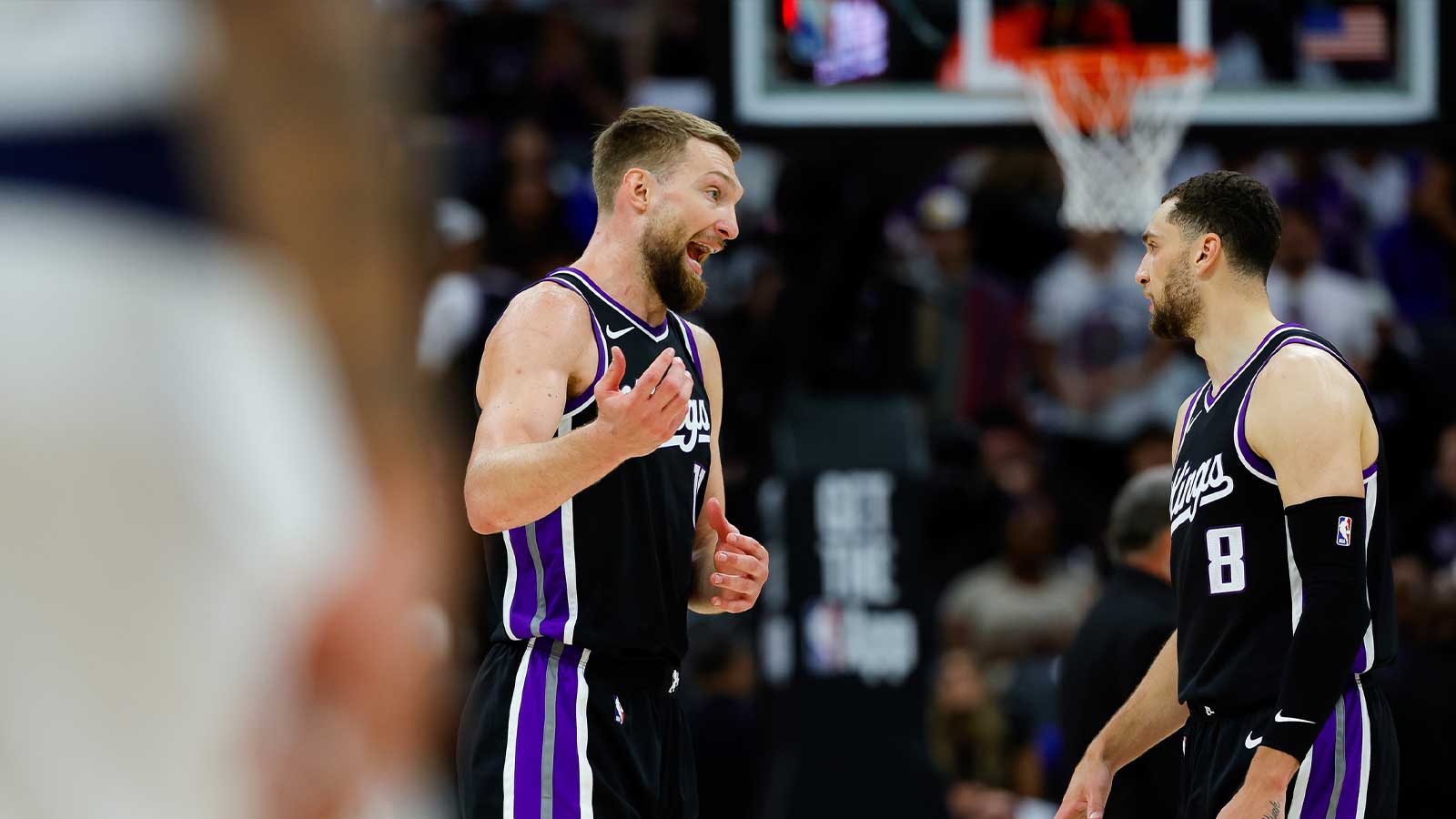 Sacramento Kings forward Domantas Sabonis (11) talks with guard Zach LaVine (8) during the second quarter against the Dallas Mavericks at Golden 1 Center.
