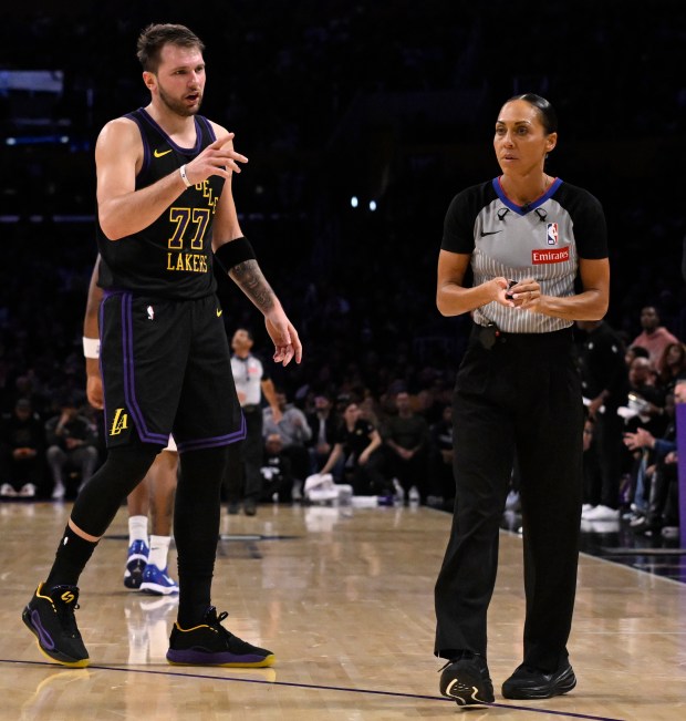 Lakers star Luka Doncic reacts toward an official during the...