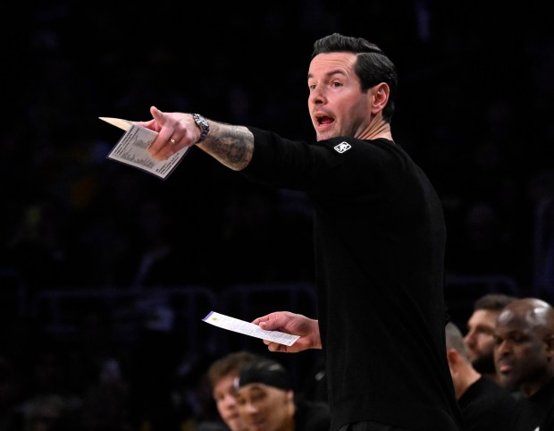 Lakers head coach JJ Redick reacts on the sideline during...