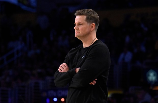 Utah Jazz head coach Will Hardy looks on from the...