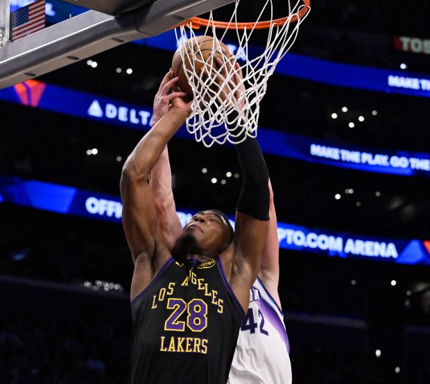 Lakers forward Rui Hachimura looks to score as Utah Jazz...