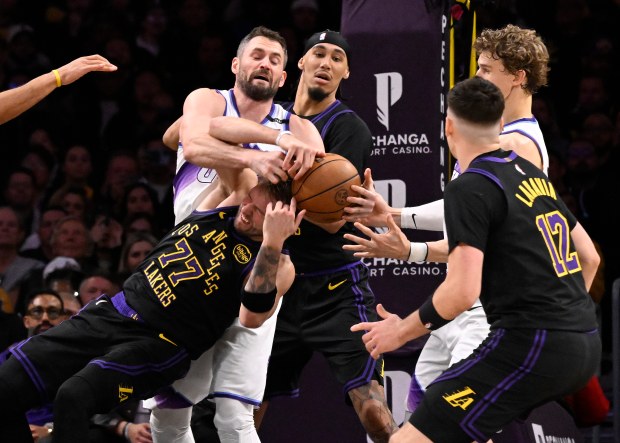 Utah Jazz forward Kevin Love (42) fouls Lakers star Luka...
