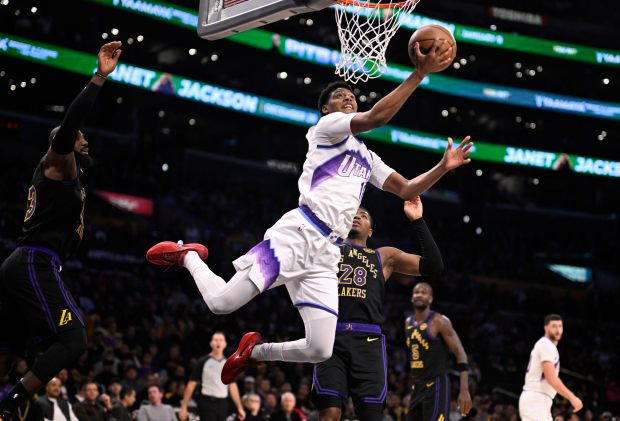 Utah Jazz rookie Ace Bailey drives to the basket in...