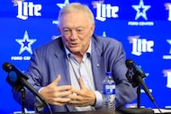Dallas Cowboys owner Jerry Jones responds a reporters question about trading defensive end...