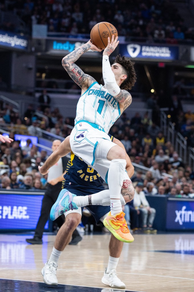 Charlotte Hornets guard LaMelo Ball (1) shoots the ball in the first half against the Indiana Pacers at Gainbridge Fieldhouse. 