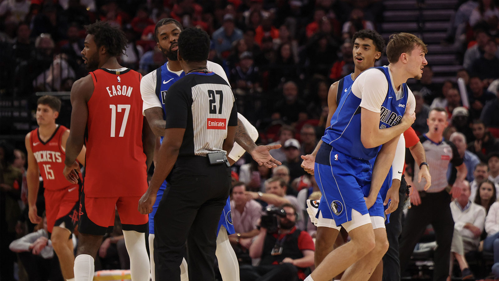 Dallas Mavericks forward Cooper Flagg (32) injures his arm against the Houston Rockets in the second quarter at Toyota Center.
