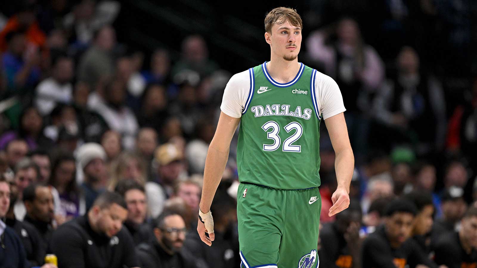 Dallas Mavericks forward Cooper Flagg (32) walks back up the court during the second half against the Phoenix Suns at the American Airlines Center.