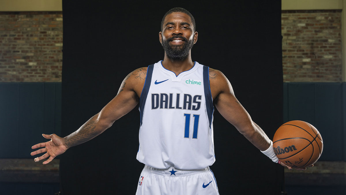 Mavericks guard Kyrie Irving (11) poses