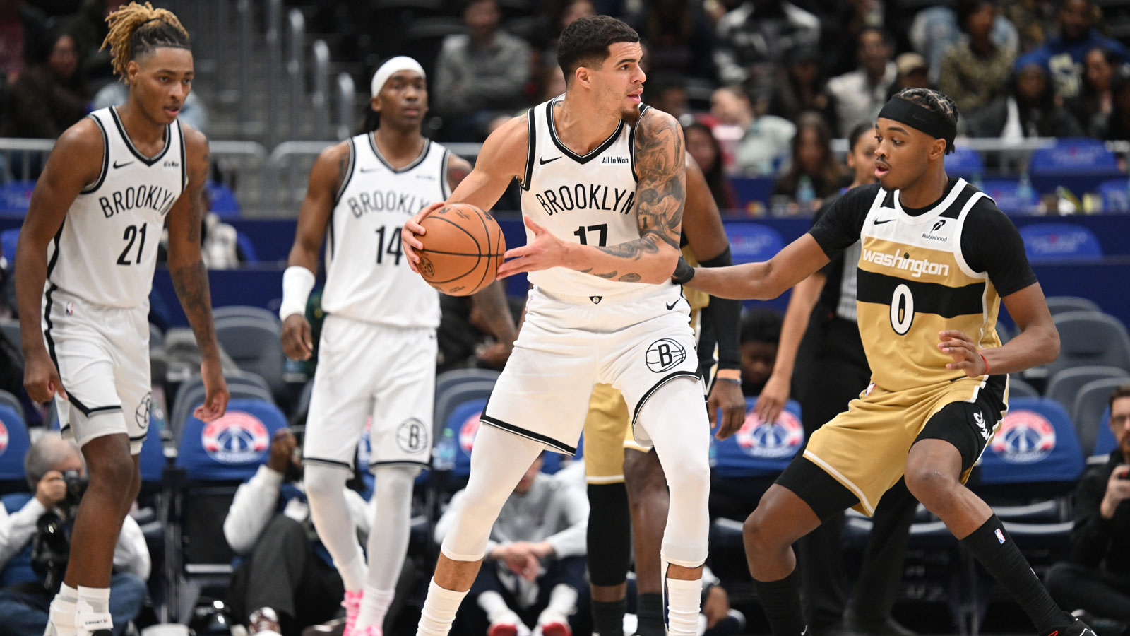 Brooklyn Nets forward Michael Porter Jr. (17) looks to pass the ball infant to Washington Wizards guard Bilal Coulibaly (0) during the third quarter at Capital One Arena.
