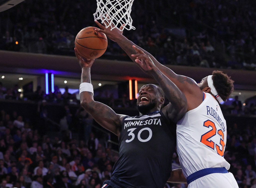 Mitchell Robinson looks to block Julius Randle's shot during the third quarter of the Knicks' blowout home win over the Timberwolves.