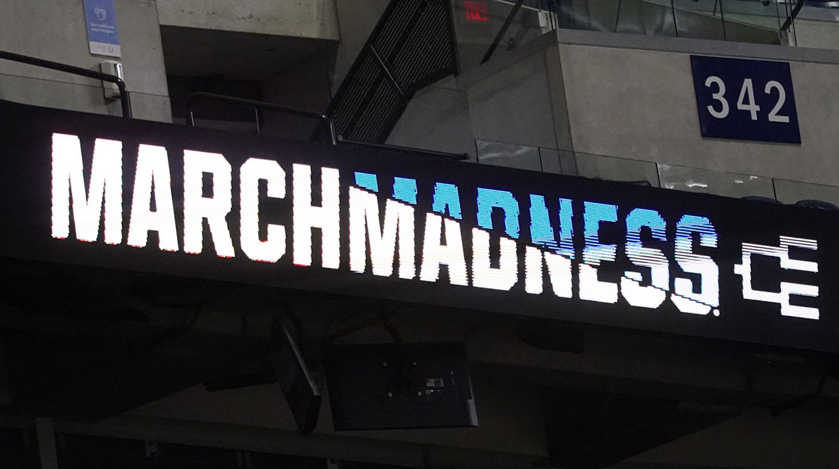 March Madness signs are displayed Tuesday, March 25, 2025, ahead of the 2025 NCAA Men’s Basketball Midwest Regional at Lucas Oil Stadium in Indianapolis.