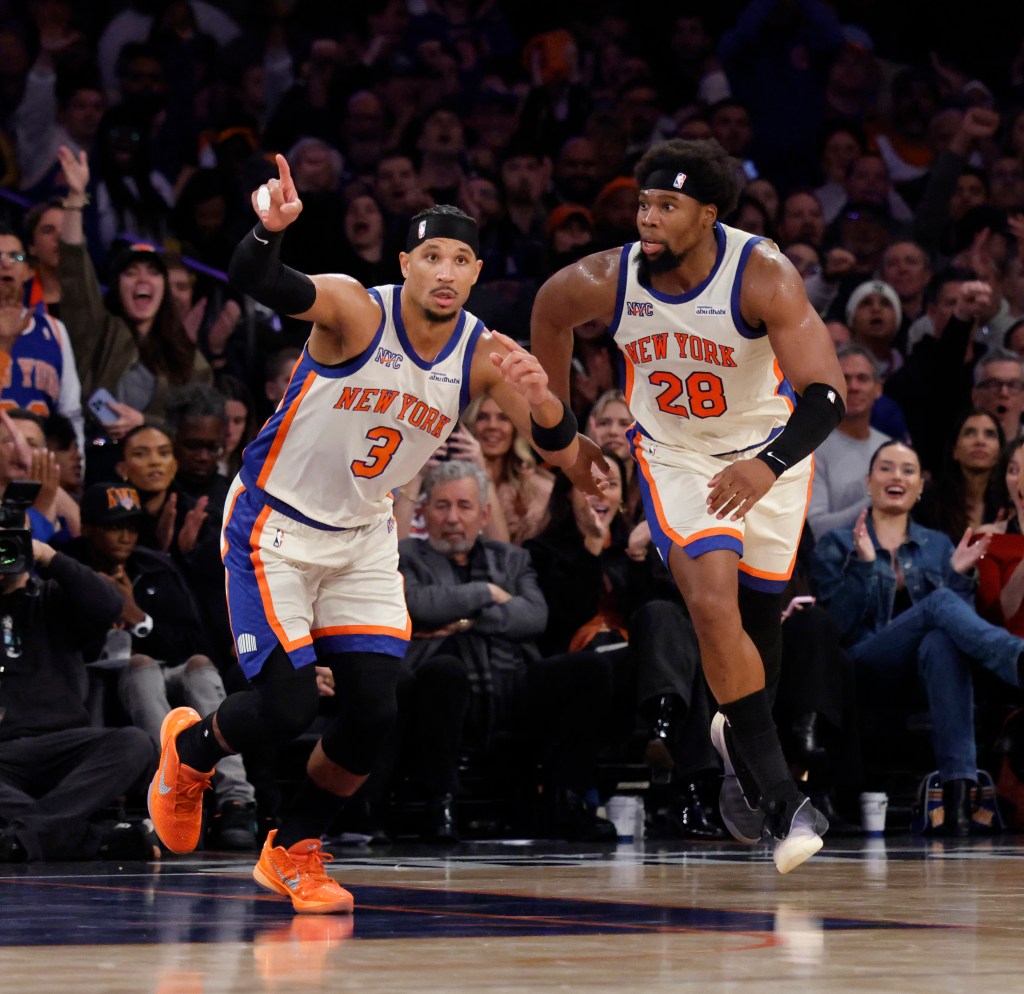 Josh Hart #3 of the New York Knicks reacts as he runs down court along side Guerschon Yabusele #28 of the New York Knicks during the first half.