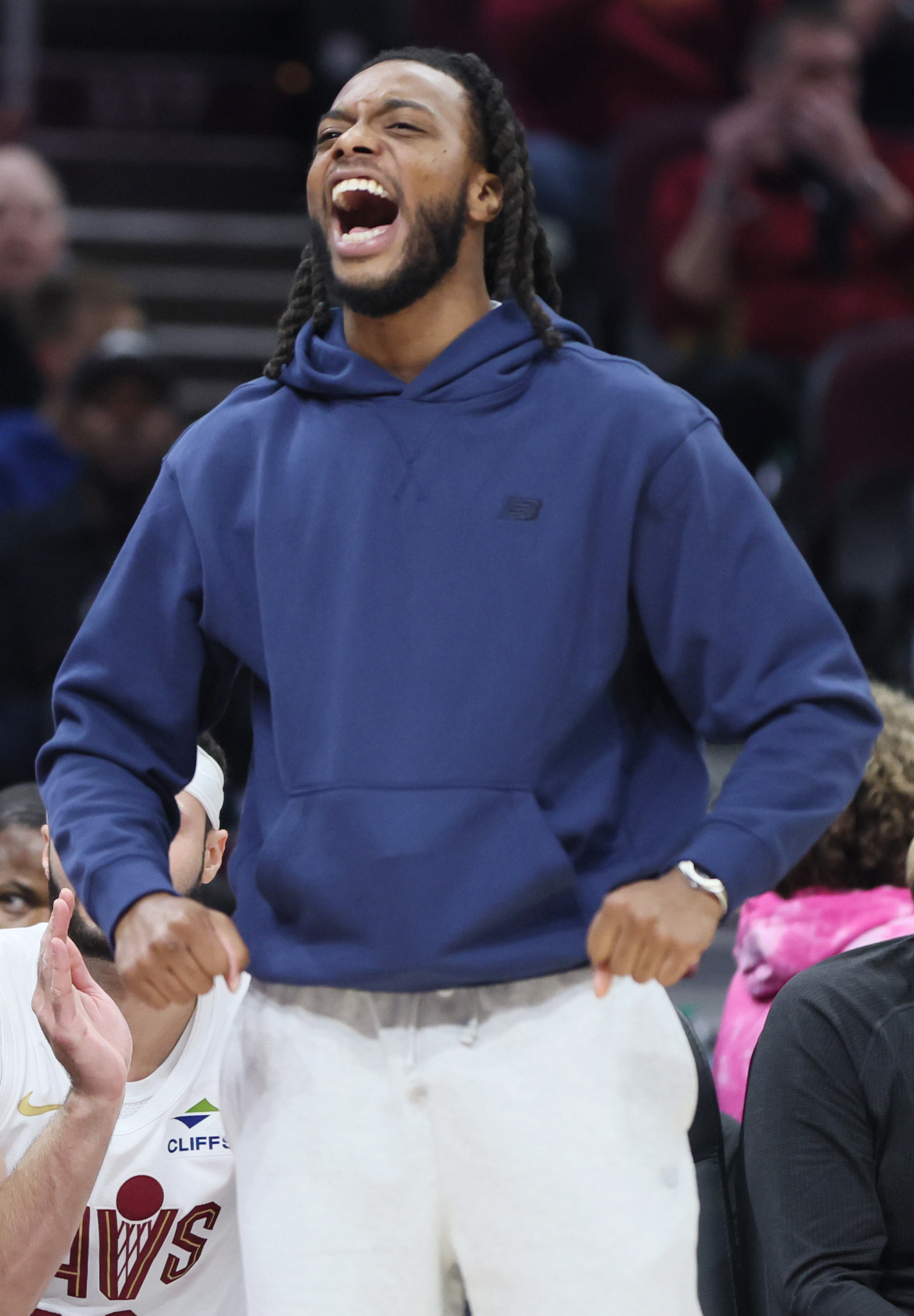 Cleveland Cavaliers guard Darius Garland celebrates a score by a teammate in the first half at Rocket Arena. 