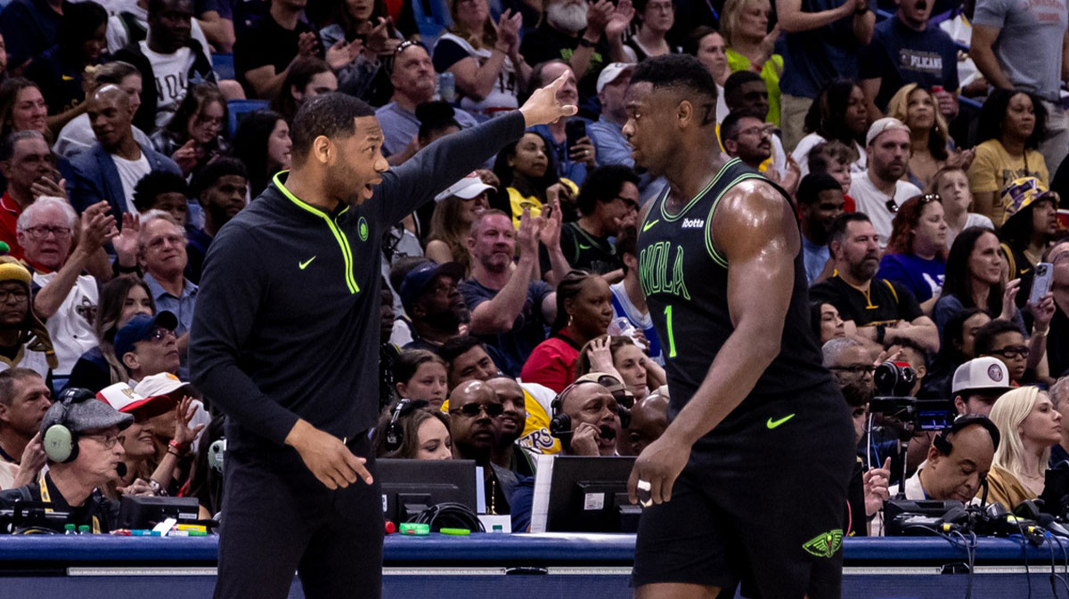 Pelicans head coach Willie Green gives direction to forward Zion Williamson