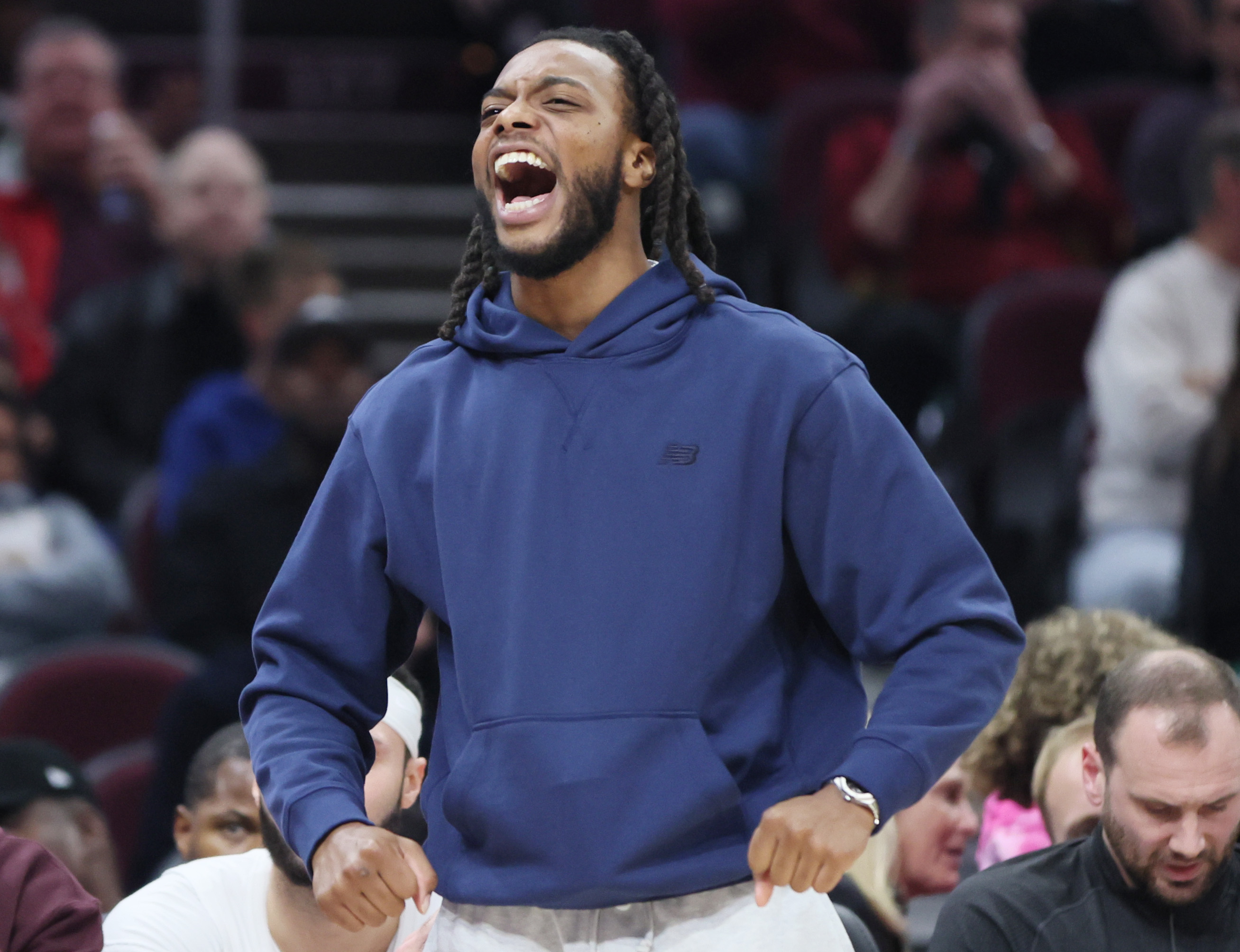 Cleveland Cavaliers guard Darius Garland celebrates a score by a teammate in the first half at Rocket Arena. 