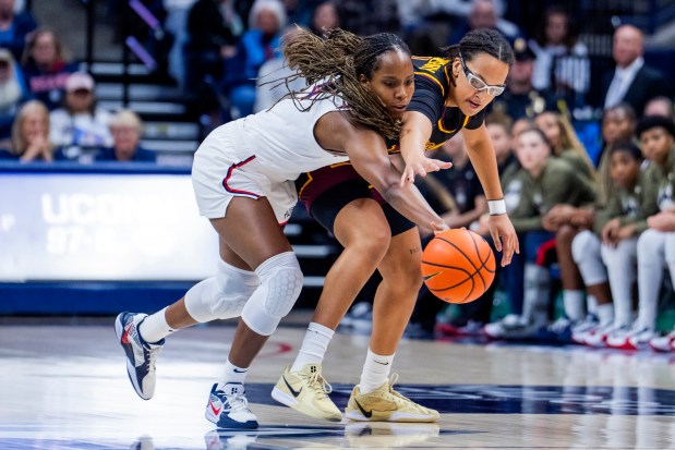 Blanca Quinonez #4 of the Connecticut Huskies gets the steal against Roisin Grandberry #1 of the Loyola Ramblers during the first half of an NCAA women's basketball game on Nov. 12, 2025 in Storrs, Connecticut. (Photo by Joe Buglewicz/Getty Images)