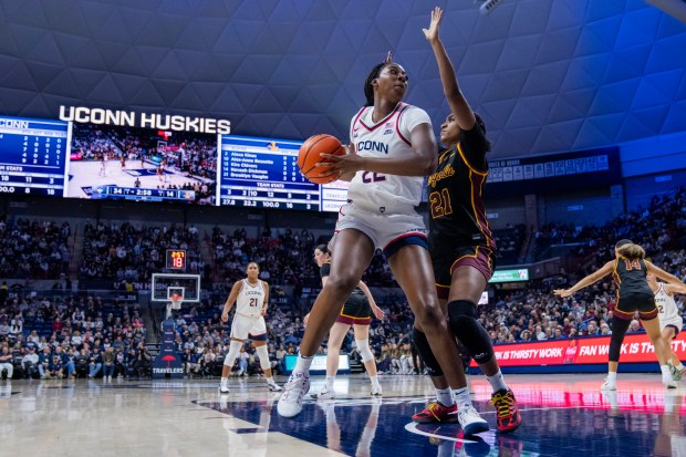 Serah Williams #22 of the Connecticut Huskies is defended by Brooklyn Vaughn #21 of the Loyola Ramblers during the first half of an NCAA women's basketball game on Nov. 12, 2025 in Storrs, Connecticut. (Photo by Joe Buglewicz/Getty Images)