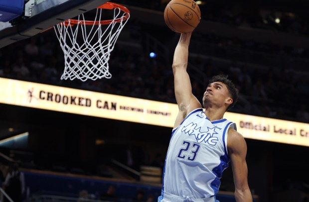 Orlando forward Tristan da Silva swoops in for a slam...