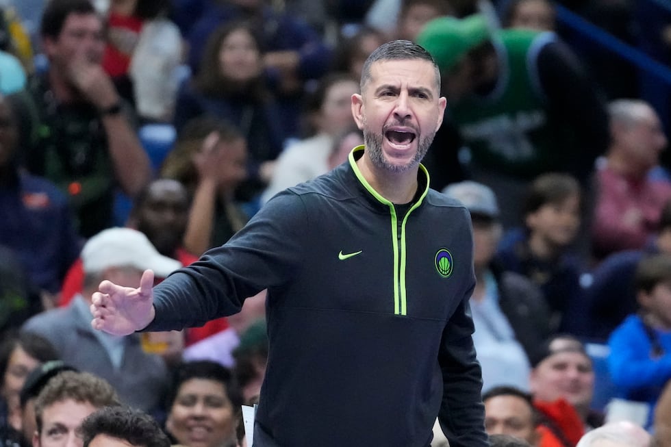 New Orleans Pelicans acting head coach James Borrego calls out from the bench in the first...