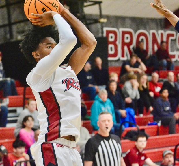 Rider’s Flash Burton shoots a jumper against Coppin State during...