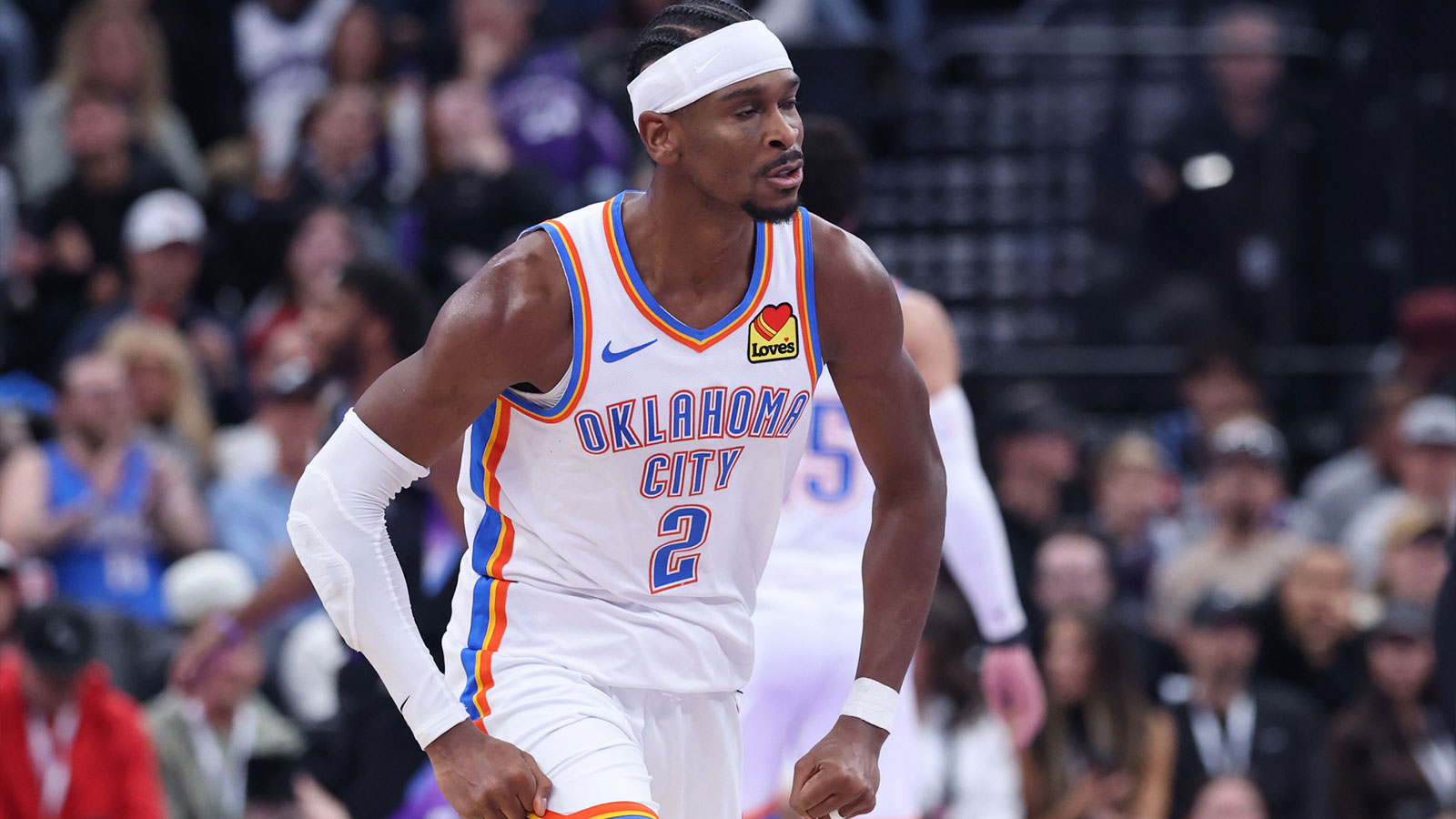 Thunder guard Shai Gilgeous-Alexander (2) reacts to a shot against the Utah Jazz during the second half at Delta Center