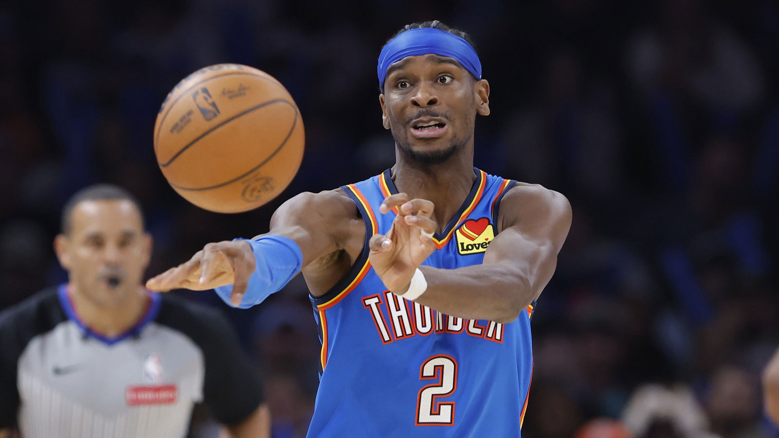 Thunder guard Shai Gilgeous-Alexander (2) passes against the Washington Wizards during the second half at Paycom Center