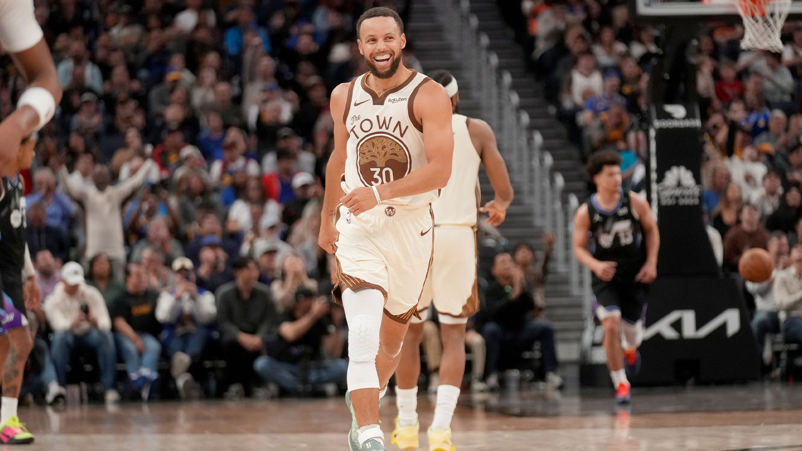 Golden State Warriors guard Stephen Curry (30) reacts after making a three point basket against the Utah Jazz in the fourth quarter at the Chase Center.