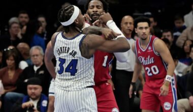 Sixers Andre Drummond and Magic’s # 34 Wendell Carter Jr. get into a tussle just before the half of the Orlando Magic at Philadelphia 76ers NBA game at Xfinity Mobile Arena in Philadelphia on Tuesday, Nov. 25, 2025.