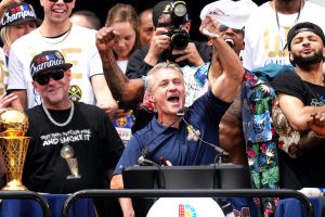 Jun 15, 2023; Denver, CO, USA; Altitude sports broadcaster Vic Lombardi speaks during the championship parade after the Denver Nuggets won the 2023 NBA Finals. Mandatory Credit: Ron Chenoy-USA TODAY Sports