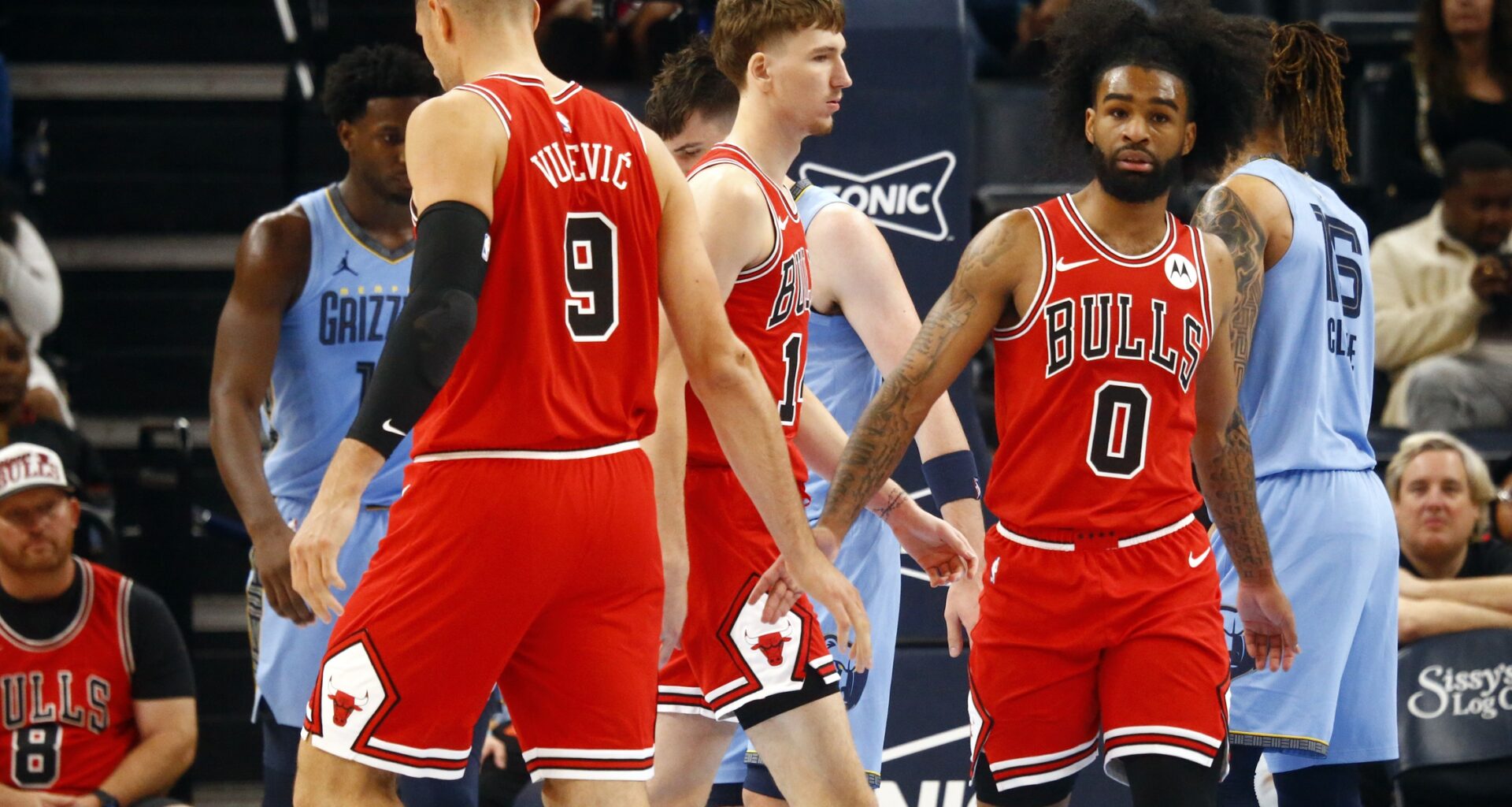 Chicago Bulls guard Coby White (0) reacts with center Nikola Vucevic (9) during the first half against the Memphis Grizzlies at FedExForum. Sports