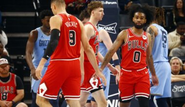 Chicago Bulls guard Coby White (0) reacts with center Nikola Vucevic (9) during the first half against the Memphis Grizzlies at FedExForum. Sports