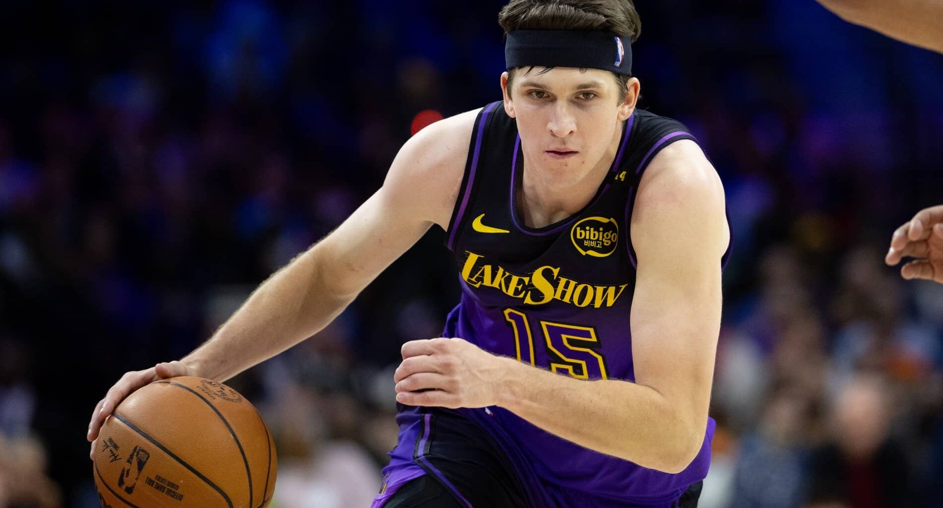 Jan 28, 2025; Philadelphia, Pennsylvania, USA; Los Angeles Lakers guard Austin Reaves (15) dribbles the ball against the Philadelphia 76ers during the second quarter at Wells Fargo Center. Mandatory Credit: Bill Streicher-Imagn Images