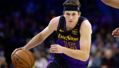 Jan 28, 2025; Philadelphia, Pennsylvania, USA; Los Angeles Lakers guard Austin Reaves (15) dribbles the ball against the Philadelphia 76ers during the second quarter at Wells Fargo Center. Mandatory Credit: Bill Streicher-Imagn Images