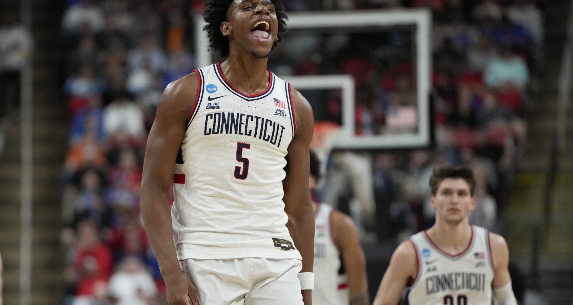 UConn Guard Azzi Fudd takes a shot against Louisville