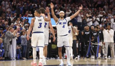 Orlando Magic players react to a play against the Miami Heat during the 2025-26 NBA season.