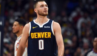 Oct 25, 2025; Denver, Colorado, USA; Denver Nuggets guard Christian Braun (0) walks back to the bench after a play during the first half against the Phoenix Suns at Ball Arena. Mandatory Credit: Christopher Hanewinckel-Imagn Images