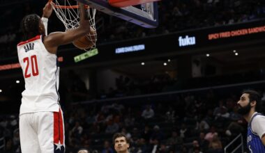 Nov 1, 2025; Washington, District of Columbia, USA; Washington Wizards center Alex Sarr (20) dunks the ball as Orlando Magic center Goga Bitadze (35) looks on in the second half at Capital One Arena. Mandatory Credit: Geoff Burke-Imagn Images