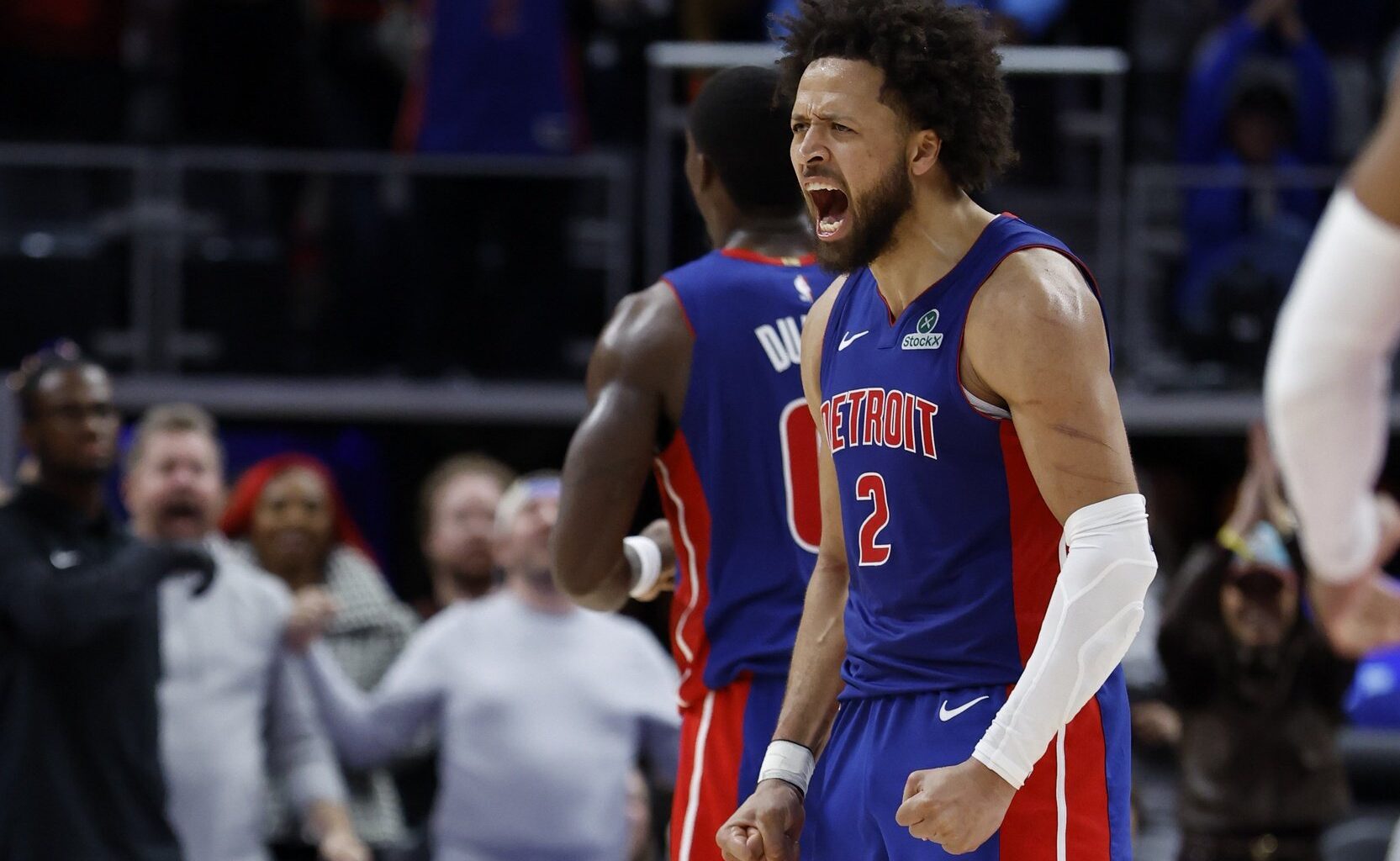 Nov 10, 2025; Detroit, Michigan, USA; Detroit Pistons guard Cade Cunningham (2) celebrates in overtime against the Washington Wizards at Little Caesars Arena. Mandatory Credit: Rick Osentoski-Imagn Images