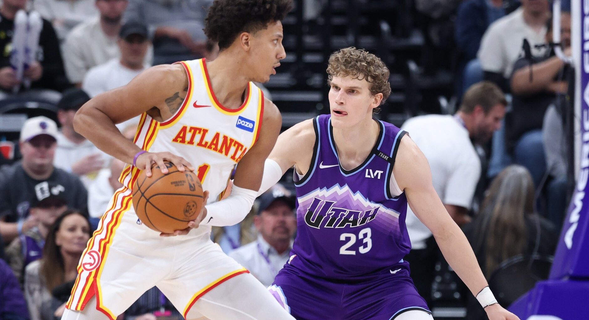 Atlanta Hawks forward Jalen Johnson (1) looks to drive against Utah Jazz forward Lauri Markkanen (23) during the second half at Delta Center.