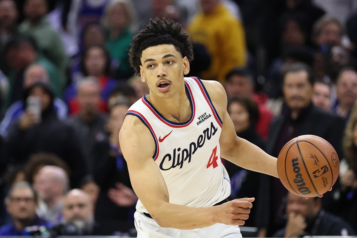 Nov 17, 2025; Philadelphia, Pennsylvania, USA; LA Clippers guard Kobe Sanders (4) in action against the Philadelphia 76ers during the fourth quarter at Xfinity Mobile Arena. Mandatory Credit: Bill Streicher-Imagn Images