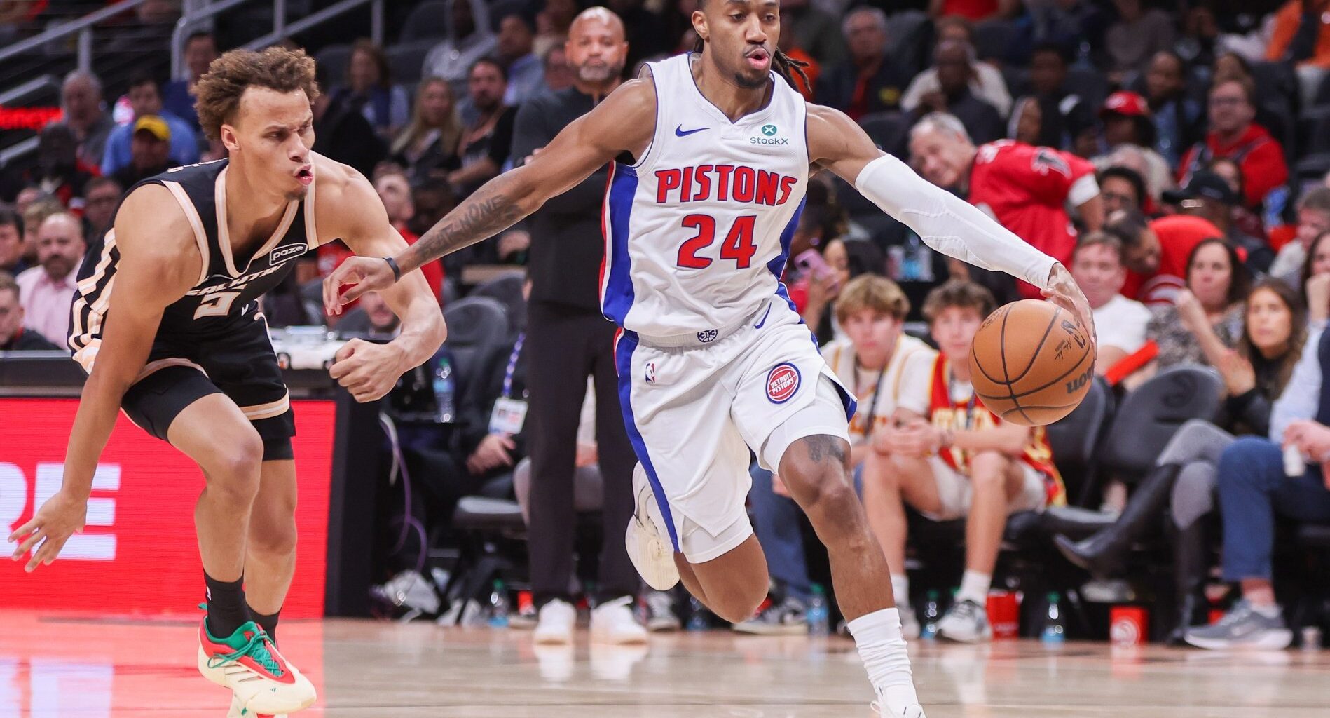 Detroit Pistons guard Daniss Jenkins (24) drives to the basket against the Atlanta Hawks in the second quarter at State Farm Arena.